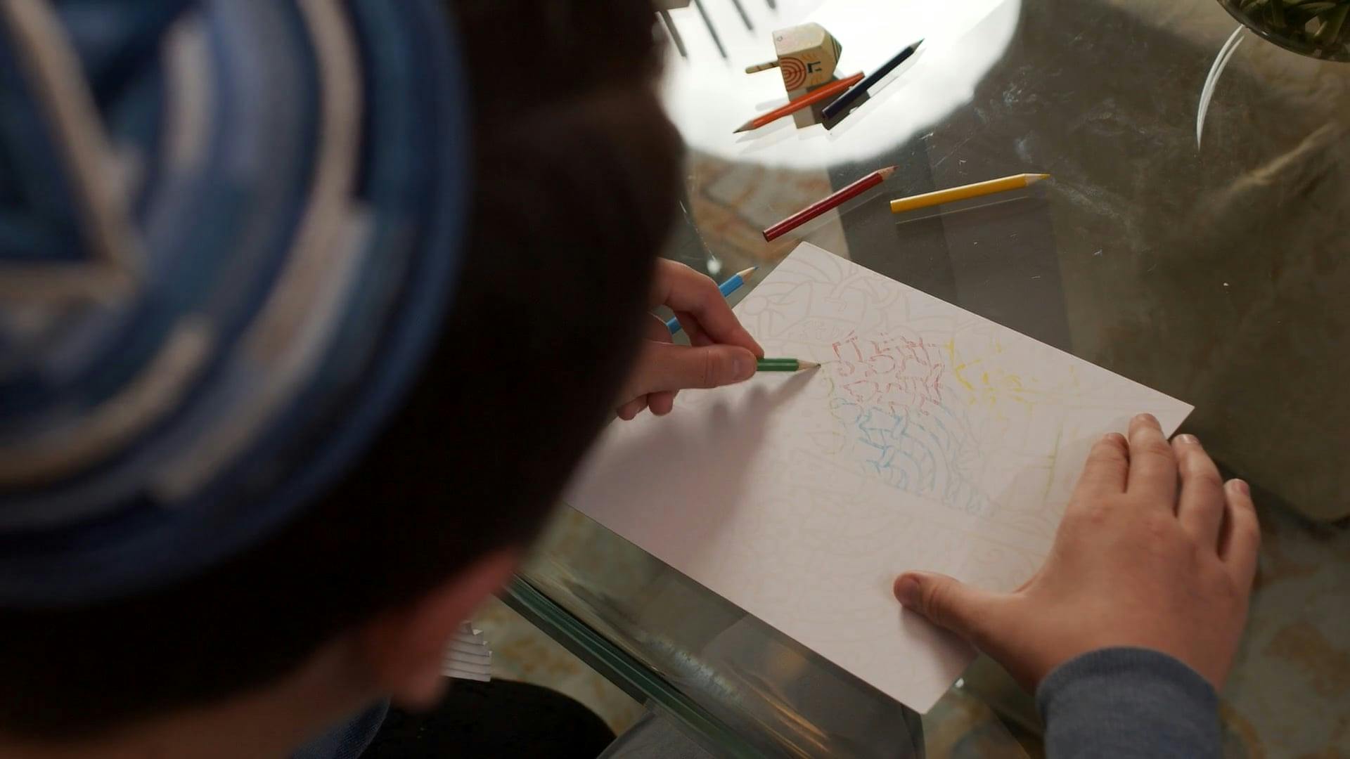 Boy Doing Hanukkah Artwork · Free Stock Video