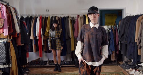 Models Posing in a Vintage Clothing Showroom