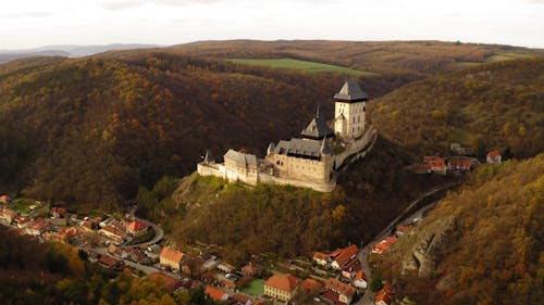 Drone Footage of a Karlstejn Castle in the Middle of a Forest