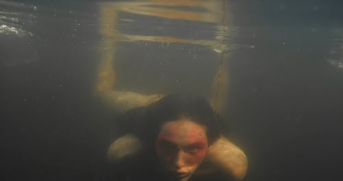 A Man Swimming Underwater