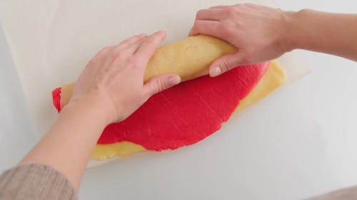 Rolling Two Colored Dough Into Layers