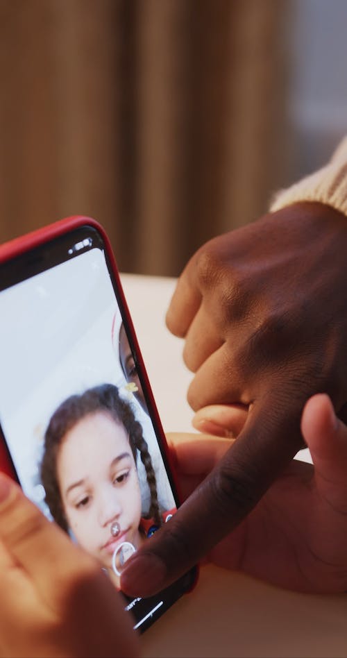 A Girl Using A Cellphone App