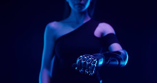 Woman with Futuristic Technology on her Artificial Arm