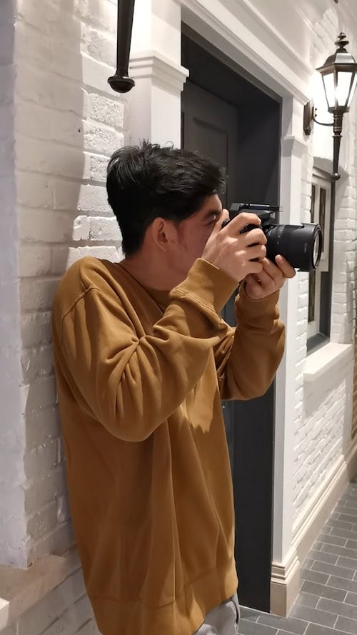 Man Taking Photo with Camera