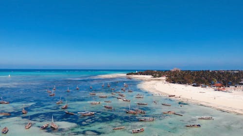 Drone Footage of a Boats near an Island