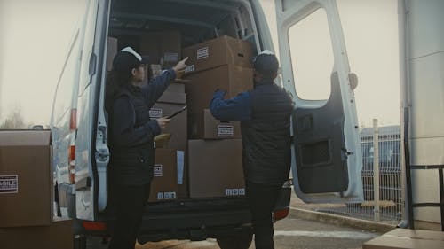Workers Unloading a Delivery Truck