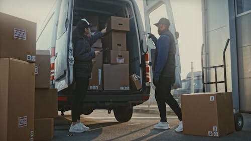 Workers Unloading a Delivery Truck