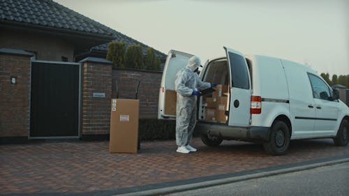 Mail Officer Wearing Protective Equipment