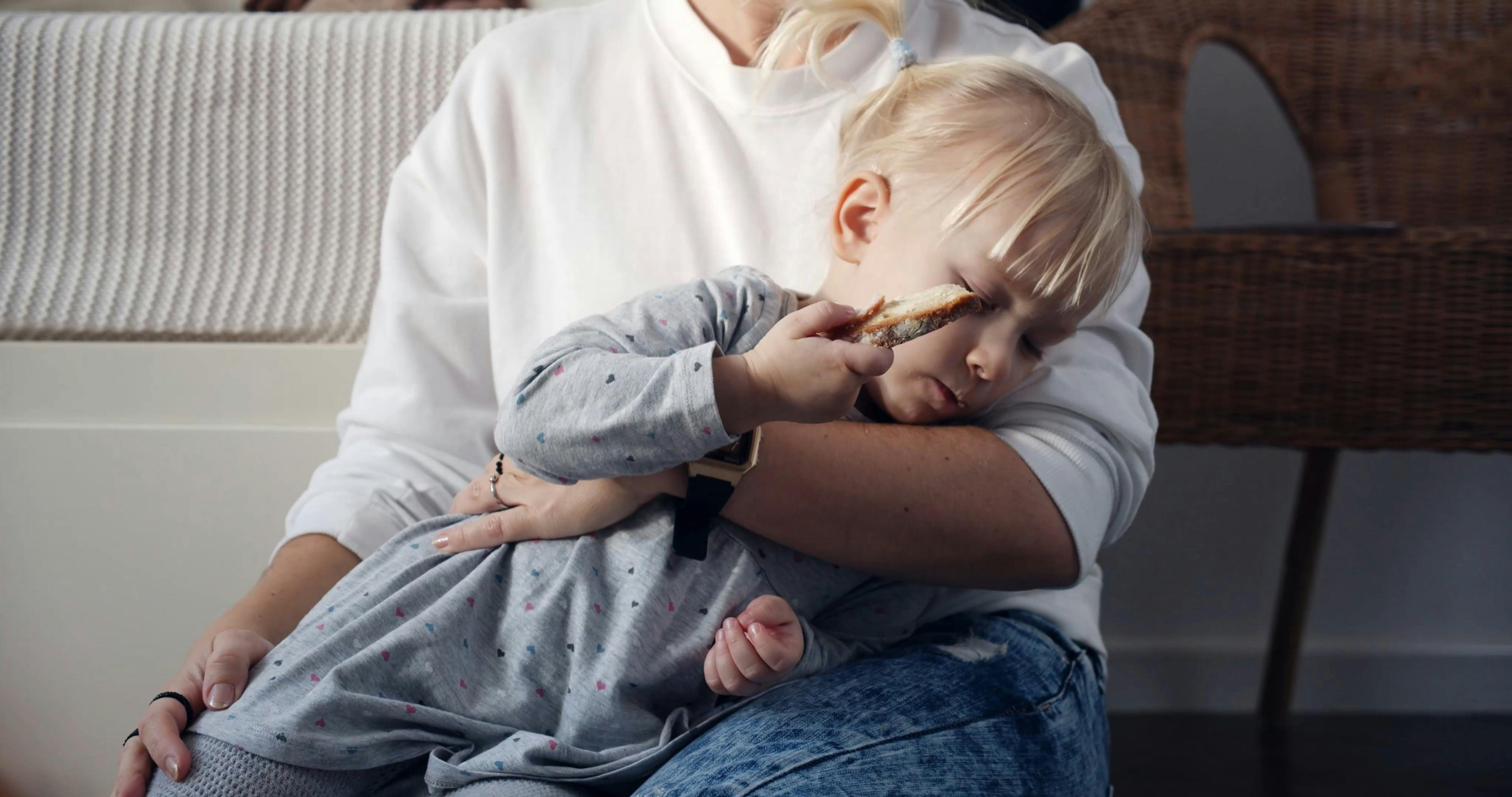 Kid Putting Blanket over a Woman · Free Stock Video