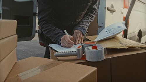 Crop Person Handling Mail Boxes