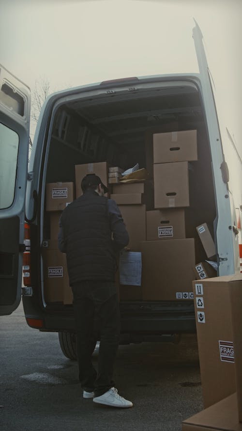 Man Unloading Delivery Truck