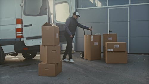 Adult Loading a Delivery Truck