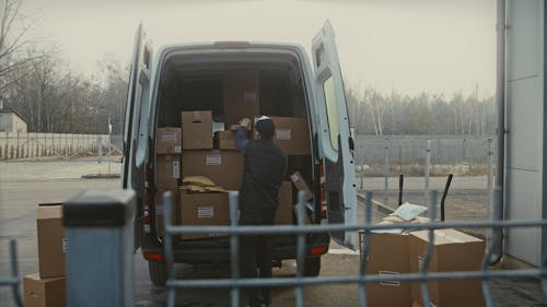 Person Unloading a Cargo Van