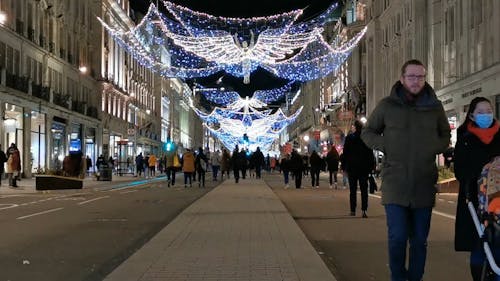 People Walking Around During a Christmas Night in London