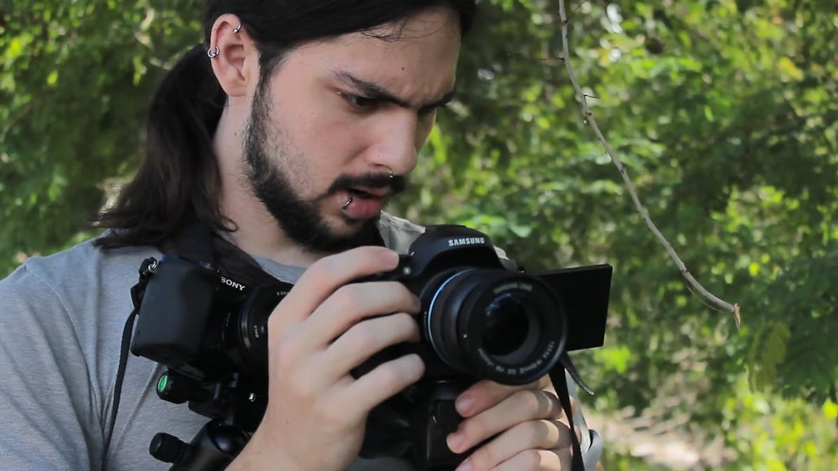 A Person Using A Modern Digital Camera Free Stock Video Footage ...