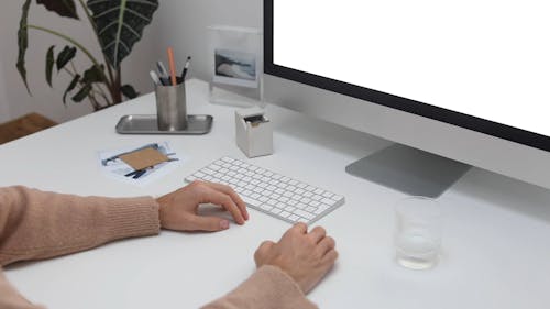 Man Using Computer Indoors