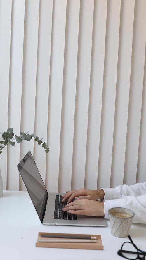 Male Hands Typing on Laptop