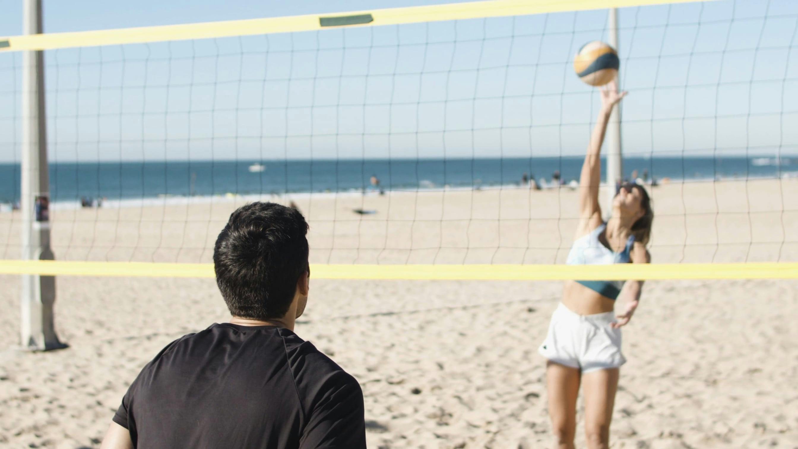 Man And Woman Playing Beach Volleyball · Free Stock Video 