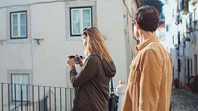 a woman taking pictures