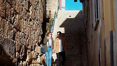 a couple walking while having conversation