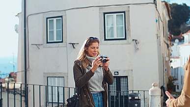 young couple of tourists taking pictures