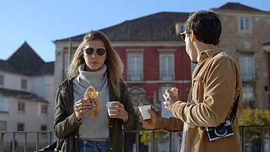 couple eating bread together