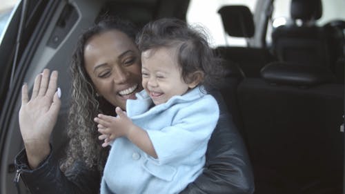 Mom and Baby Waving Hands