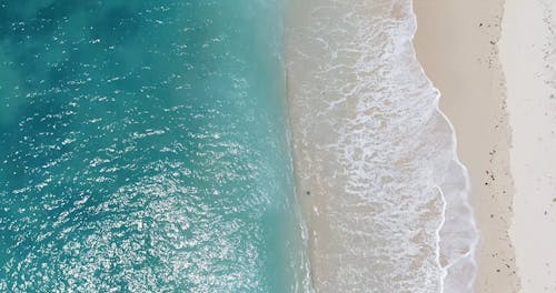 Drone Shot of Ocean Waves at the Seashore