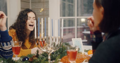 Friends Chatting with Each Other on the Dining Table