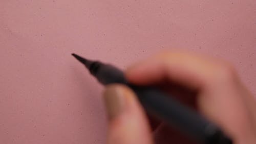 A Person Doing Calligraphy