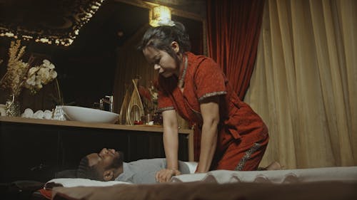 Woman Massaging a Man