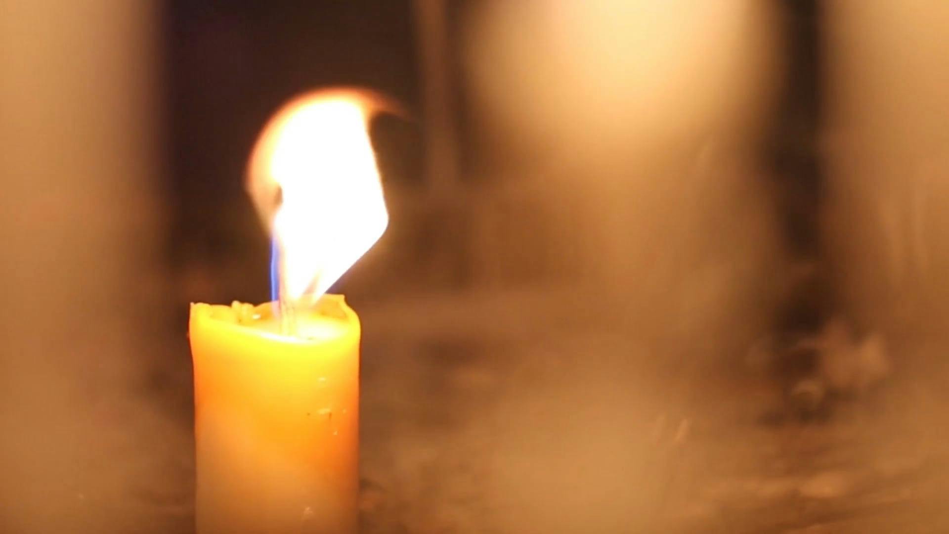 Close Up of a Lit Candle · Free Stock Video