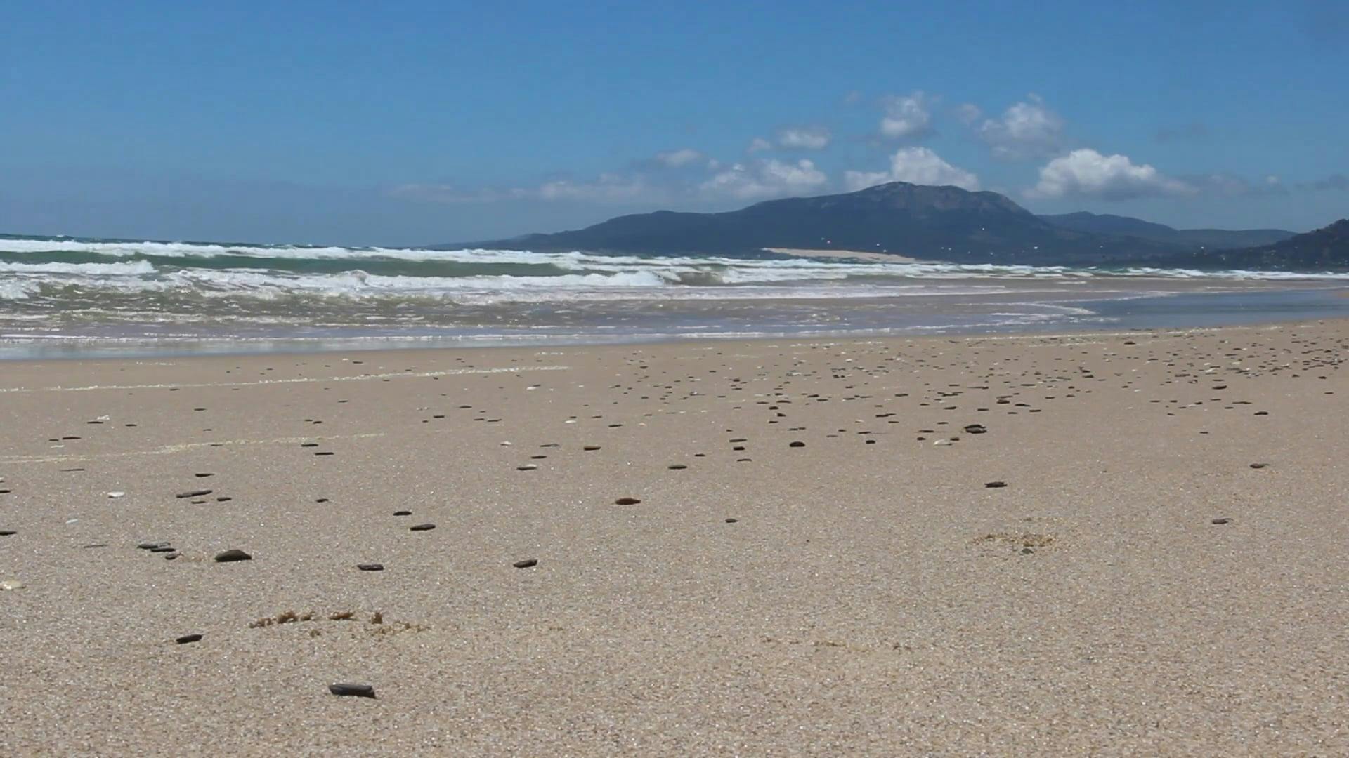 Gentle Waves Hitting The Beach Shore \u00b7 Free Stock Video