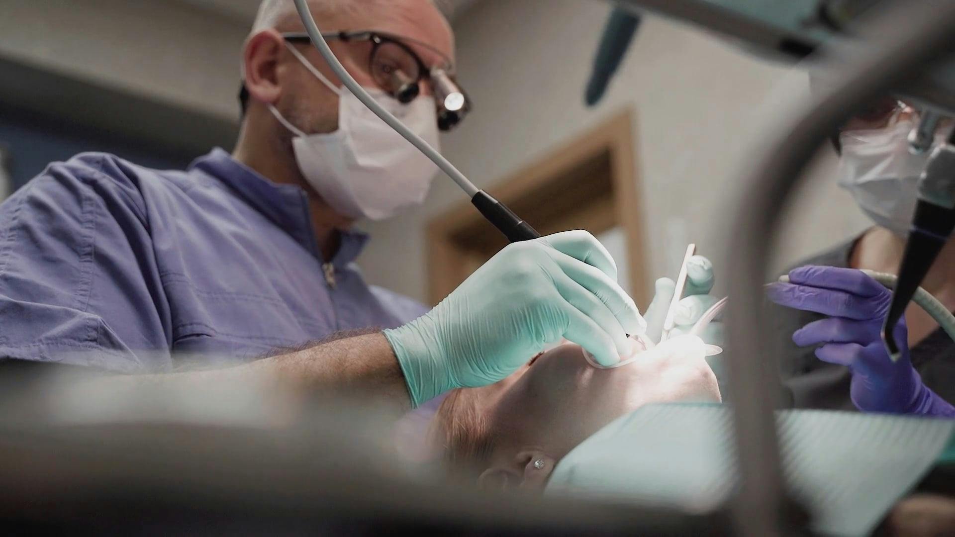 A Dentist Doing a Dental Procedure · Free Stock Video