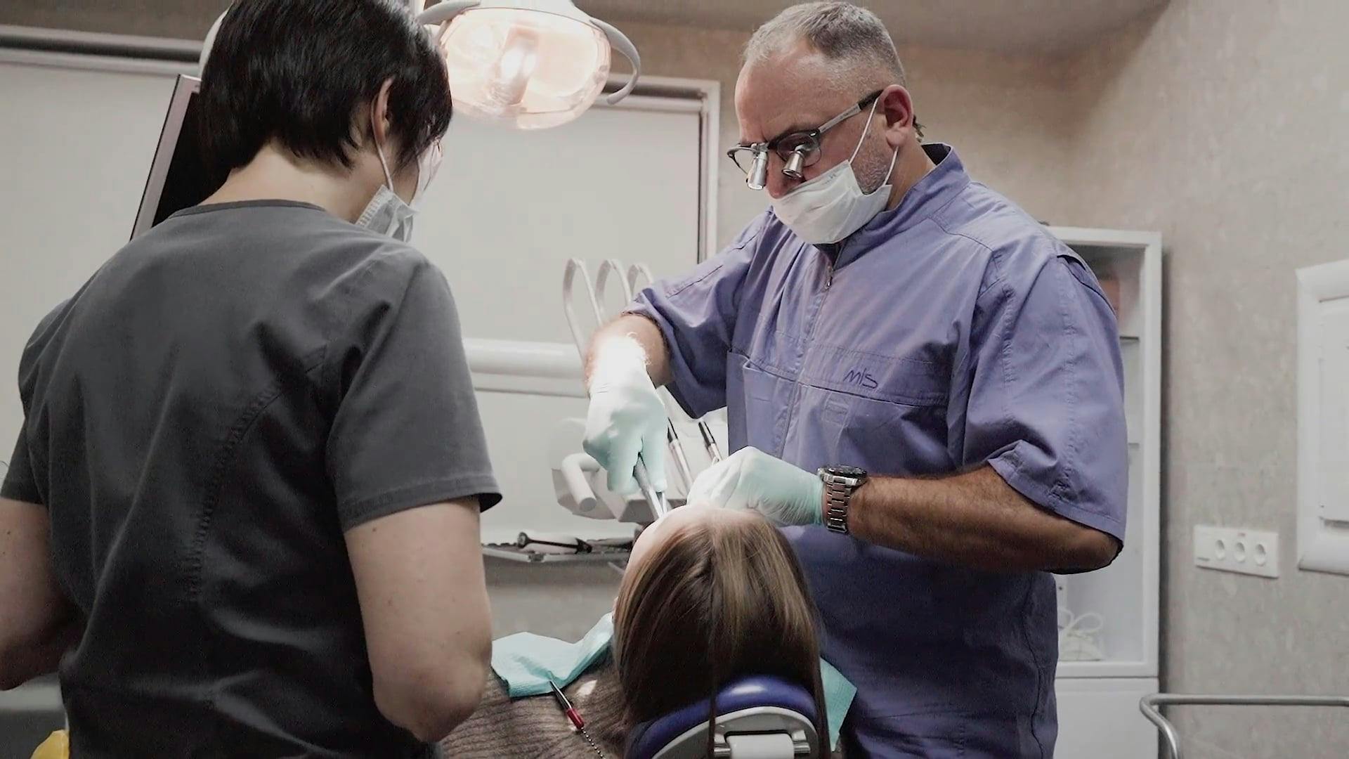 Dentists Working on a Patient · Free Stock Video