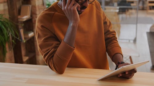 Person on a Phone Call in the Office