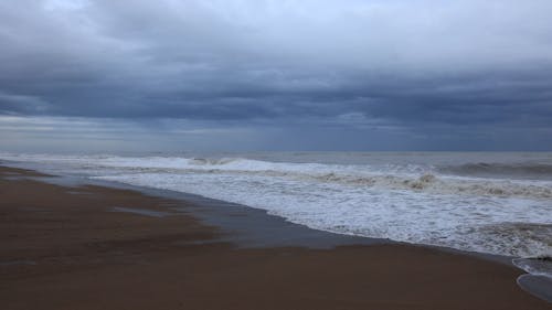 Waves In The Beach Shore