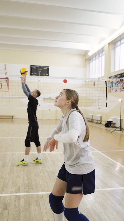 Volleyball Players Practicing Different Skills