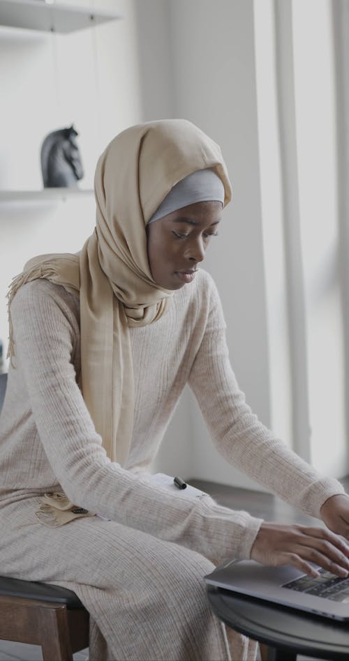 Muslim Girl Using Laptop