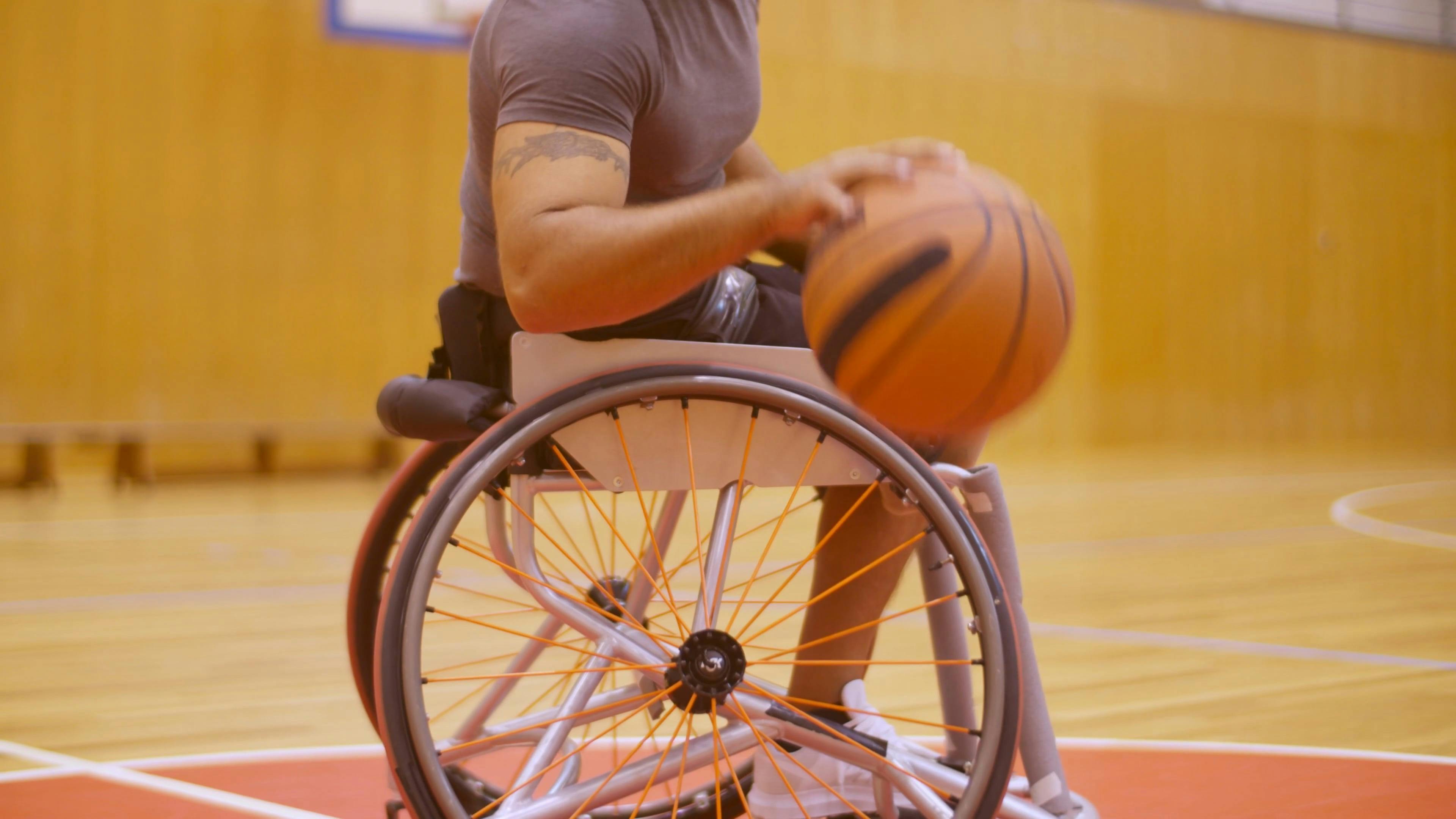 A Man On A Wheelchair Dribbling A Basketball Free Stock Video Footage ...