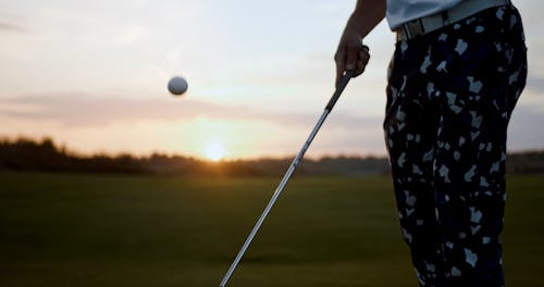 Close up of Golfer Bouncing Ball on Club