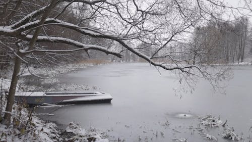 Boat in Frozen Lake