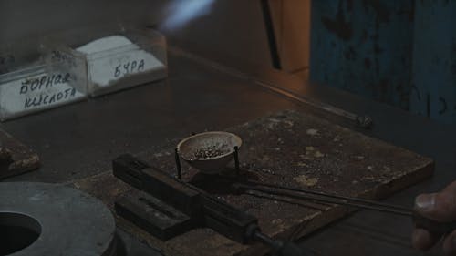 Crop Worker Melting Metal