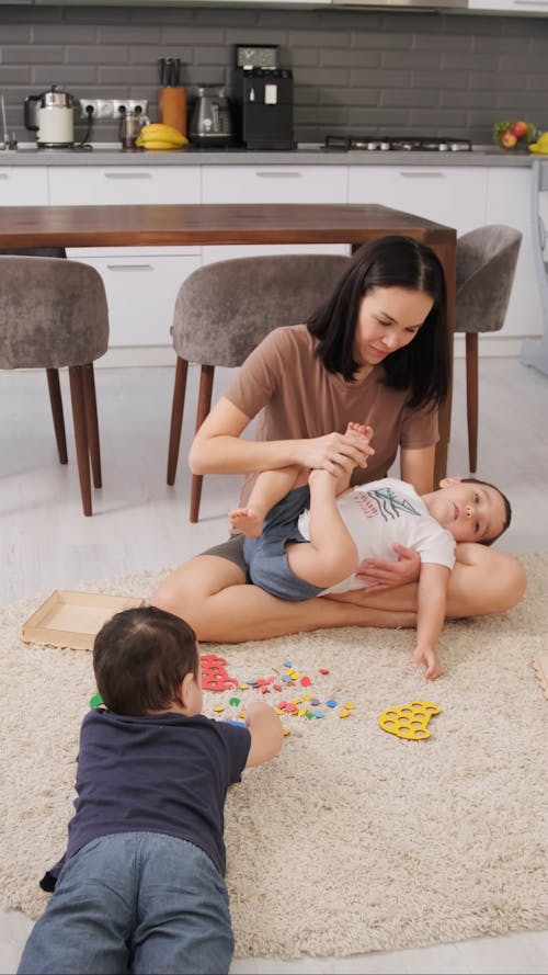 Mom Taking Care of her Twins 