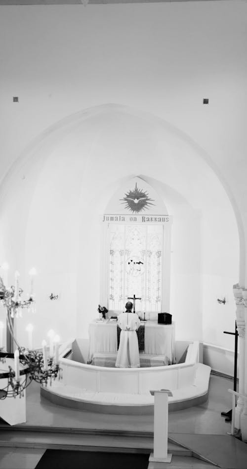 A Pastor Praying on the Altar