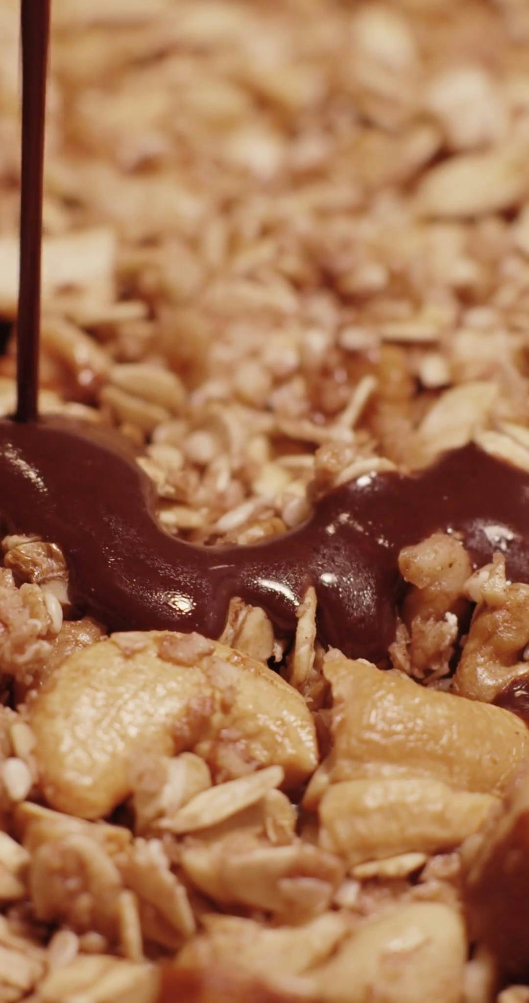 A Person Pouring Chocolate Syrup into the Cereals Free Stock Video