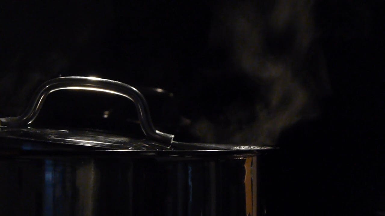 The Steam Escaping From A Pot Of Boiling Hot Water · Free Stock Video