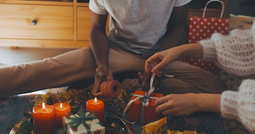 A Man and Woman Preparing for Christmas