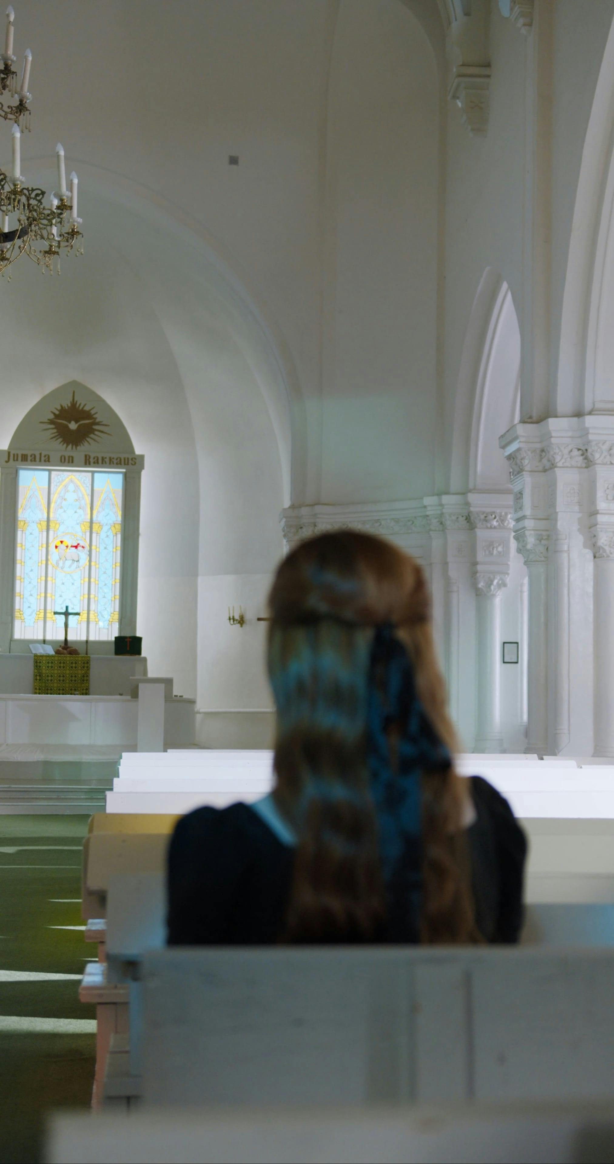 Female Sitting Inside of a Church · Free Stock Video