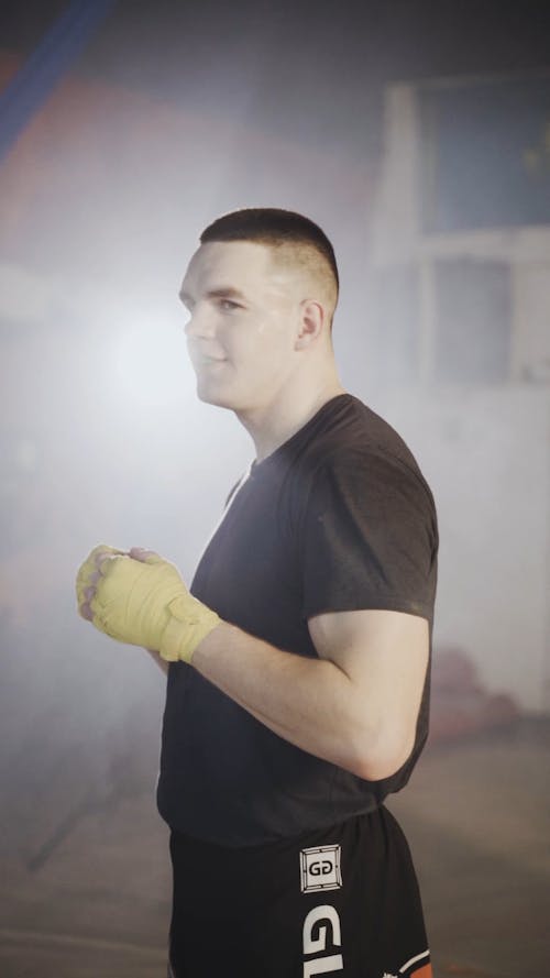 A Man Wearing Gears for Combat Sport